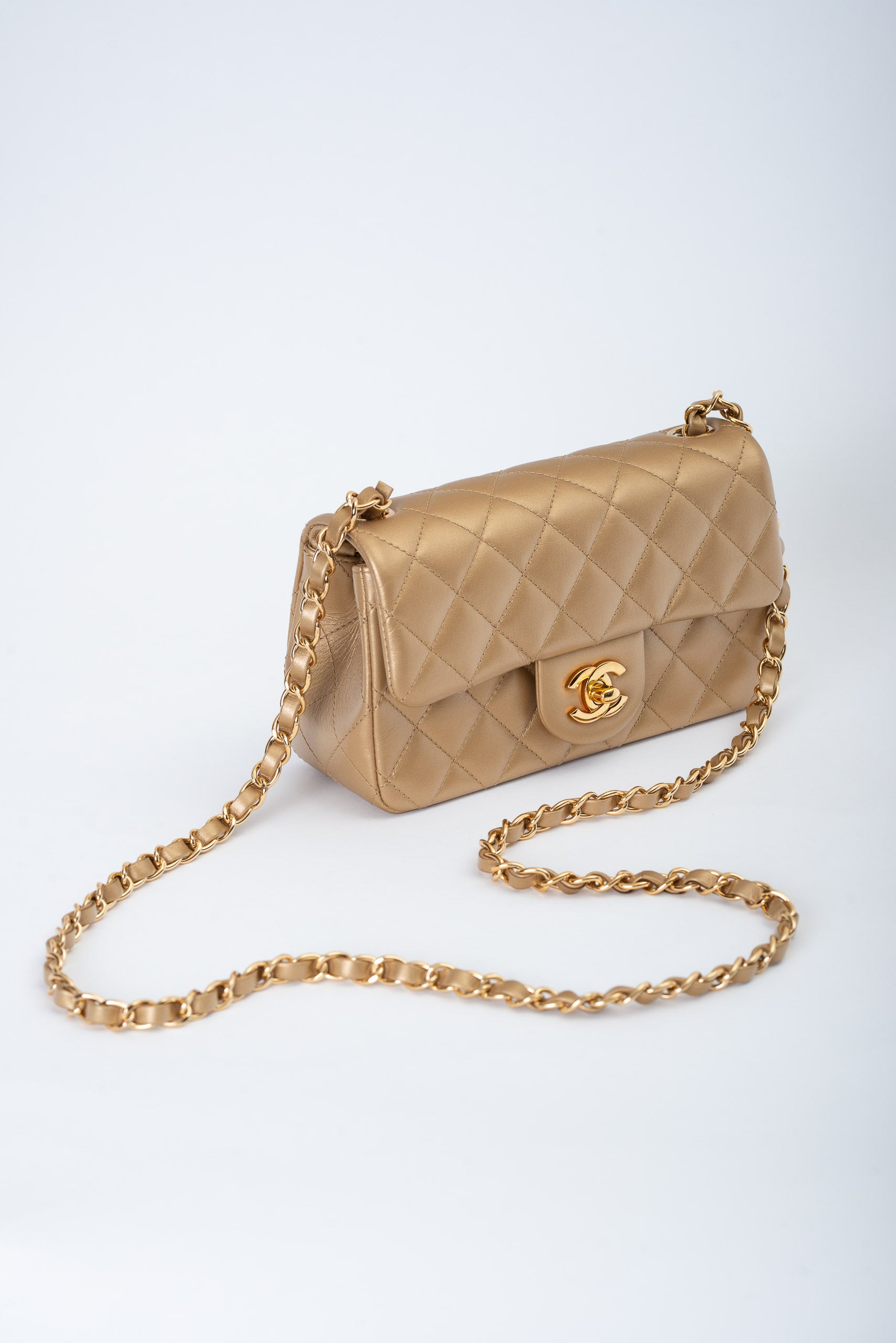 CHANEL MINI FLAP ORO